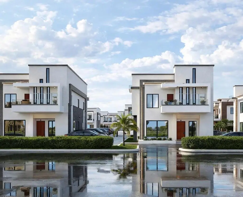 Rendering of two duplexes facing each other across the estate road, mirrored in standing rainwater
